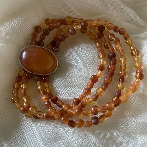 Big brown center bead with 4 stretchy strands bracelet